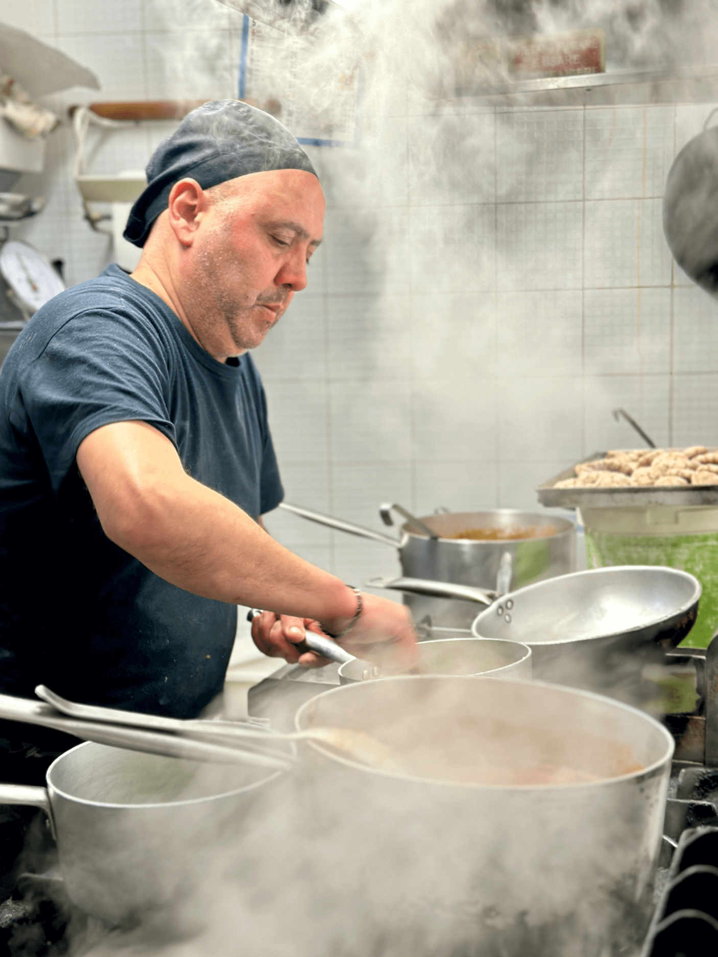 La Locanda di Nonna Mena - chef cooking and kitchen